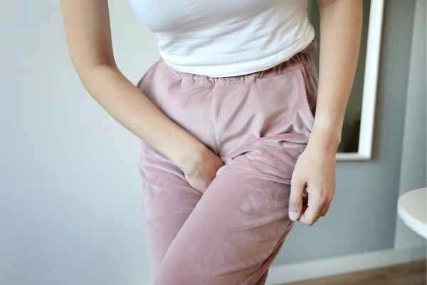 woman running for the toilet because of urinary incontinence Wednesbury